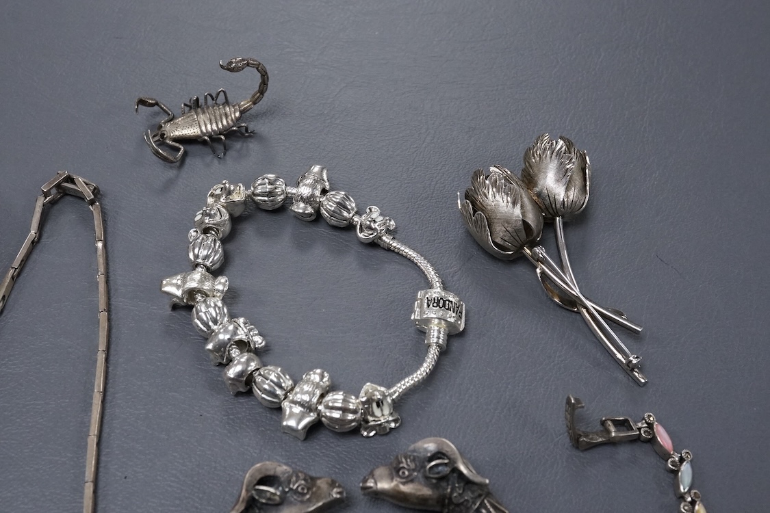 A group of assorted jewellery, including silver and white metal hinged bangles, a 1960's silver mounted cigar cutter by Ramsden & Roed, 925 necklaces and bracelet, etc.